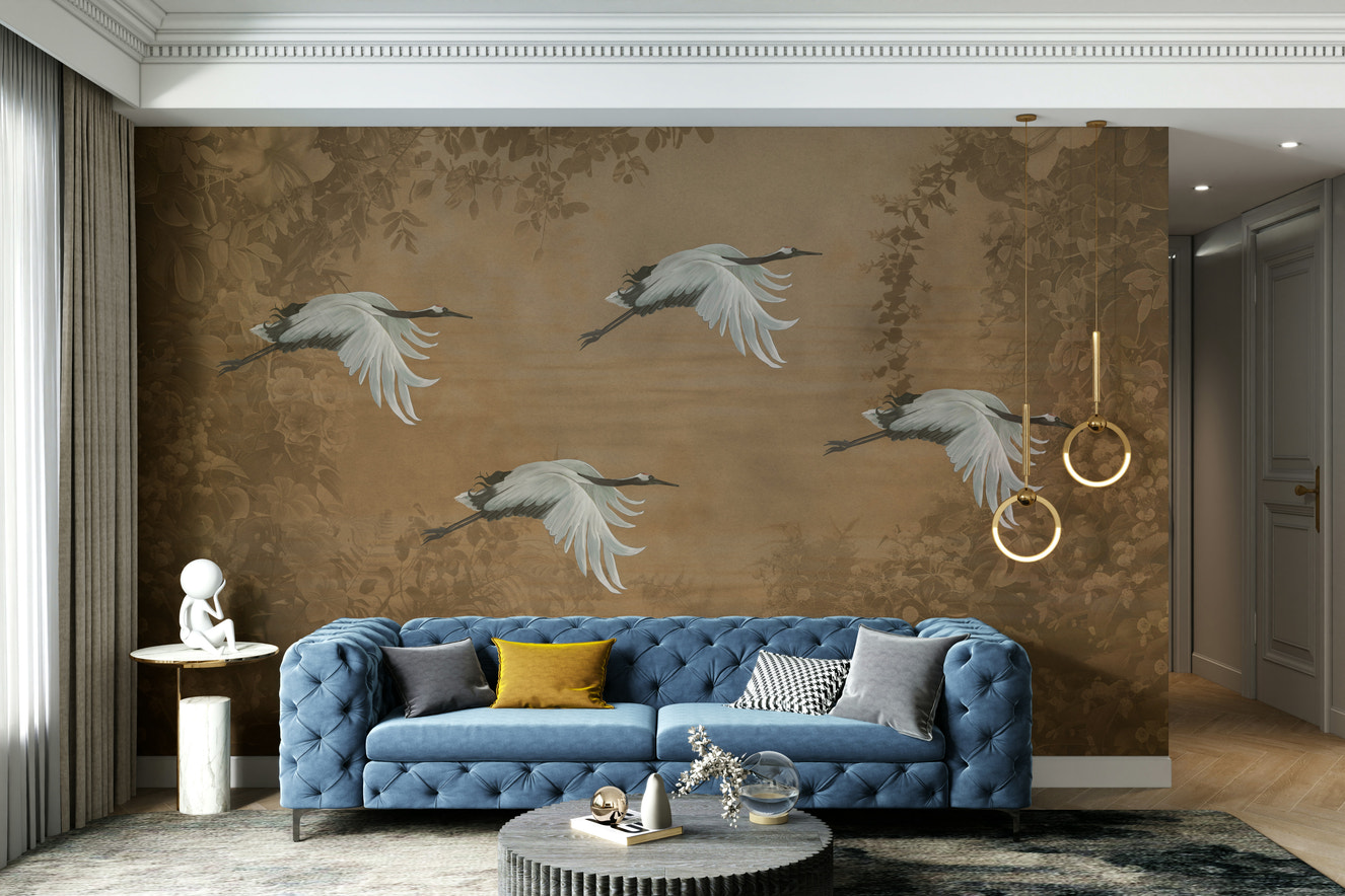 A peaceful wall mural with a design of birds and blossoms.

