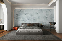 The colors are soft and gentle, with pale grays, whites, and muted tones.

