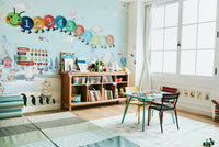 The design features soft snowflakes and snow-covered trees.

