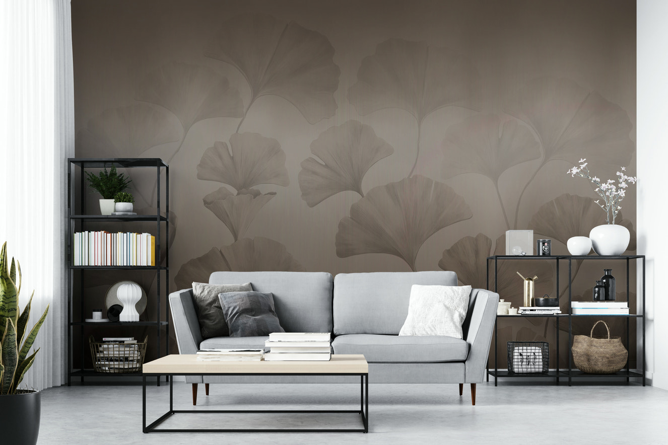 A peaceful wall mural with an elegant ginkgo leaf pattern.


