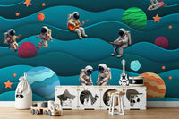 A cheerful wall mural with a whimsical, space design.

