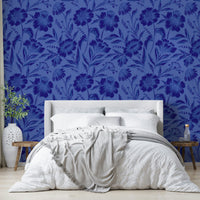 The mural is created for an entire wall, providing a sophisticated backdrop.
