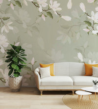 The design features a repeating pattern of soft, graceful branches and blossoms.

