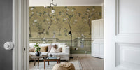 The design features a repeating pattern of soft, graceful birds and blooming branches.