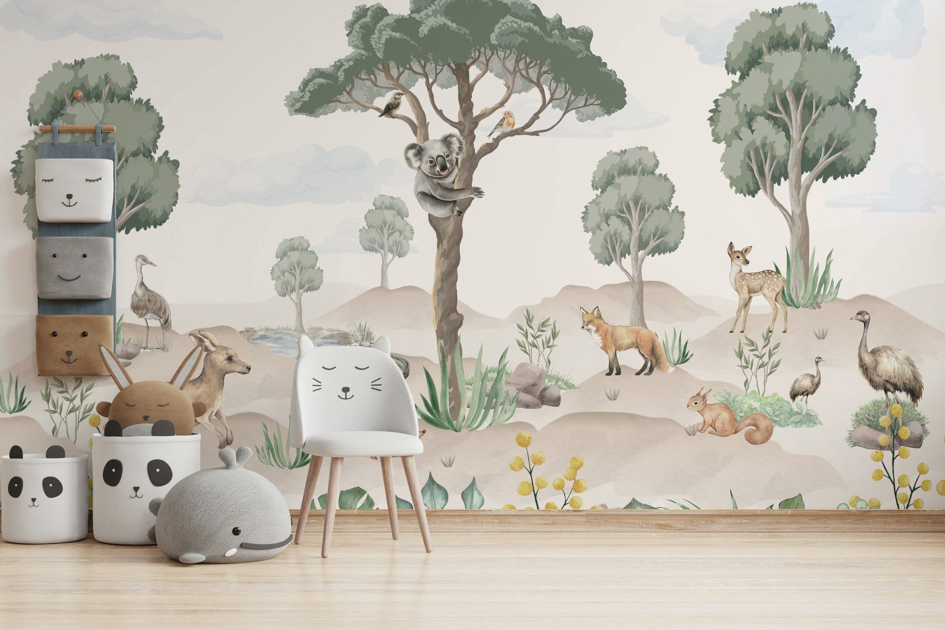 A nursery decorated with a wildlife mural

