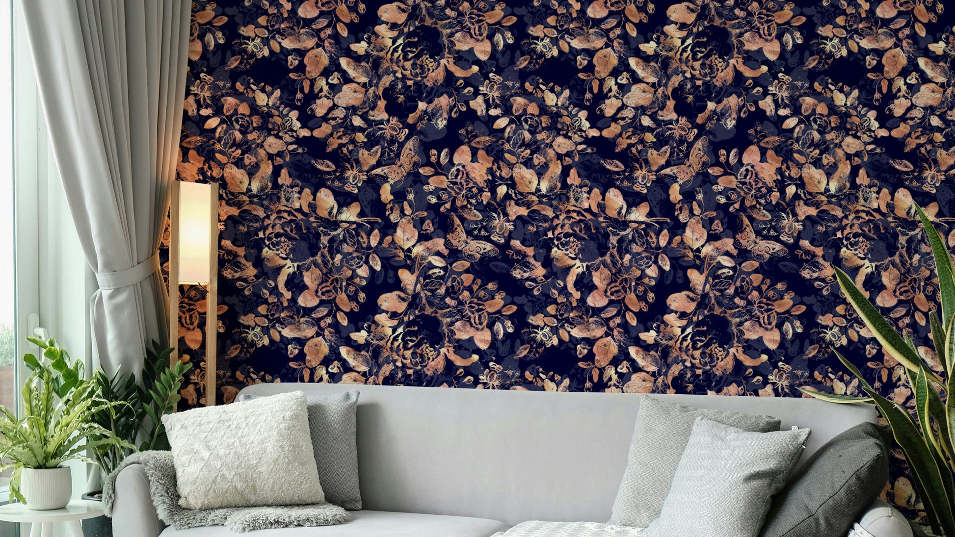 A full-wall mural showing a botanical pattern on a dark background.
