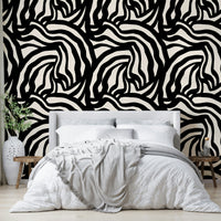 A full-wall mural showing a pattern of hand-painted lines.
