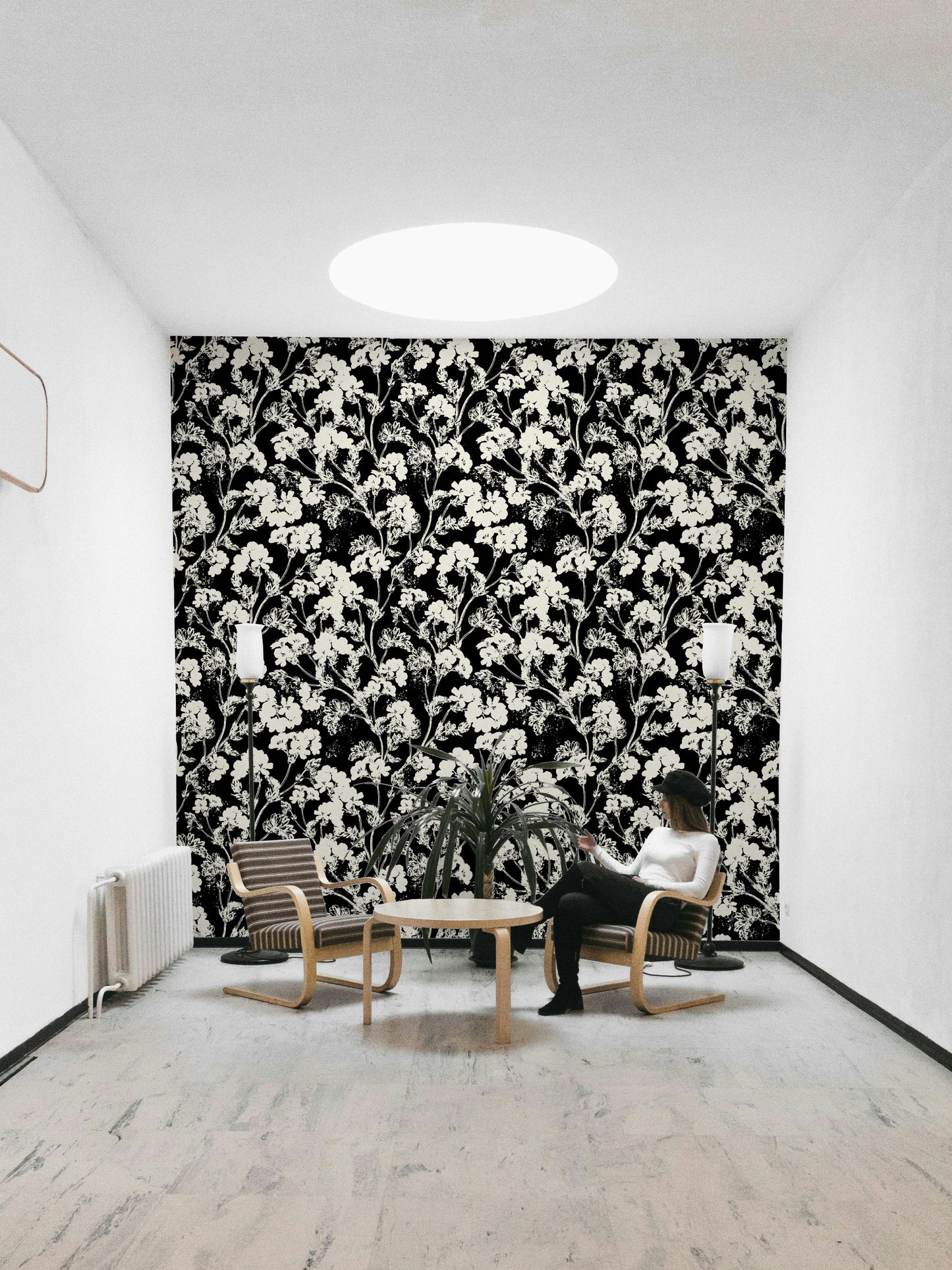 The colors are monochromatic, with different shades of white and off-white.
