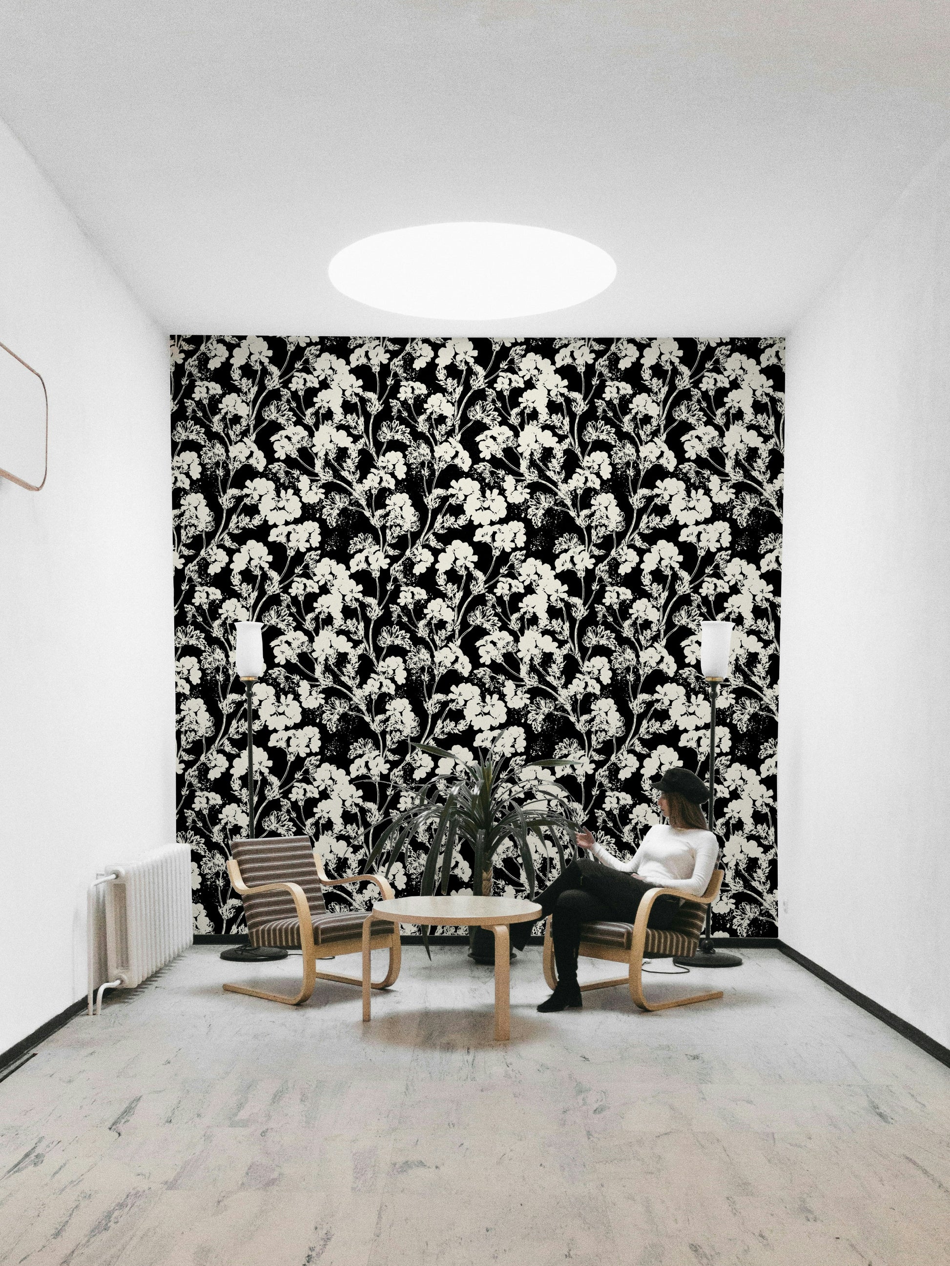 The colors are monochromatic, with different shades of white and off-white.
