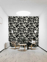 The colors are monochromatic, with different shades of white and off-white.
