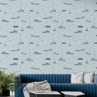 A full-wall mural showing a pattern of sketched boats.
