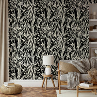 The image features stylized or abstract leaf shapes.
