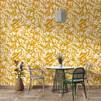 A playroom decorated with swirling wallpaper

