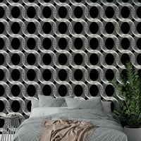 An angled shot of a wall with optical pattern wallpaper

