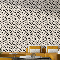 Irregular Black Spots Wallpaper on a living room wall

