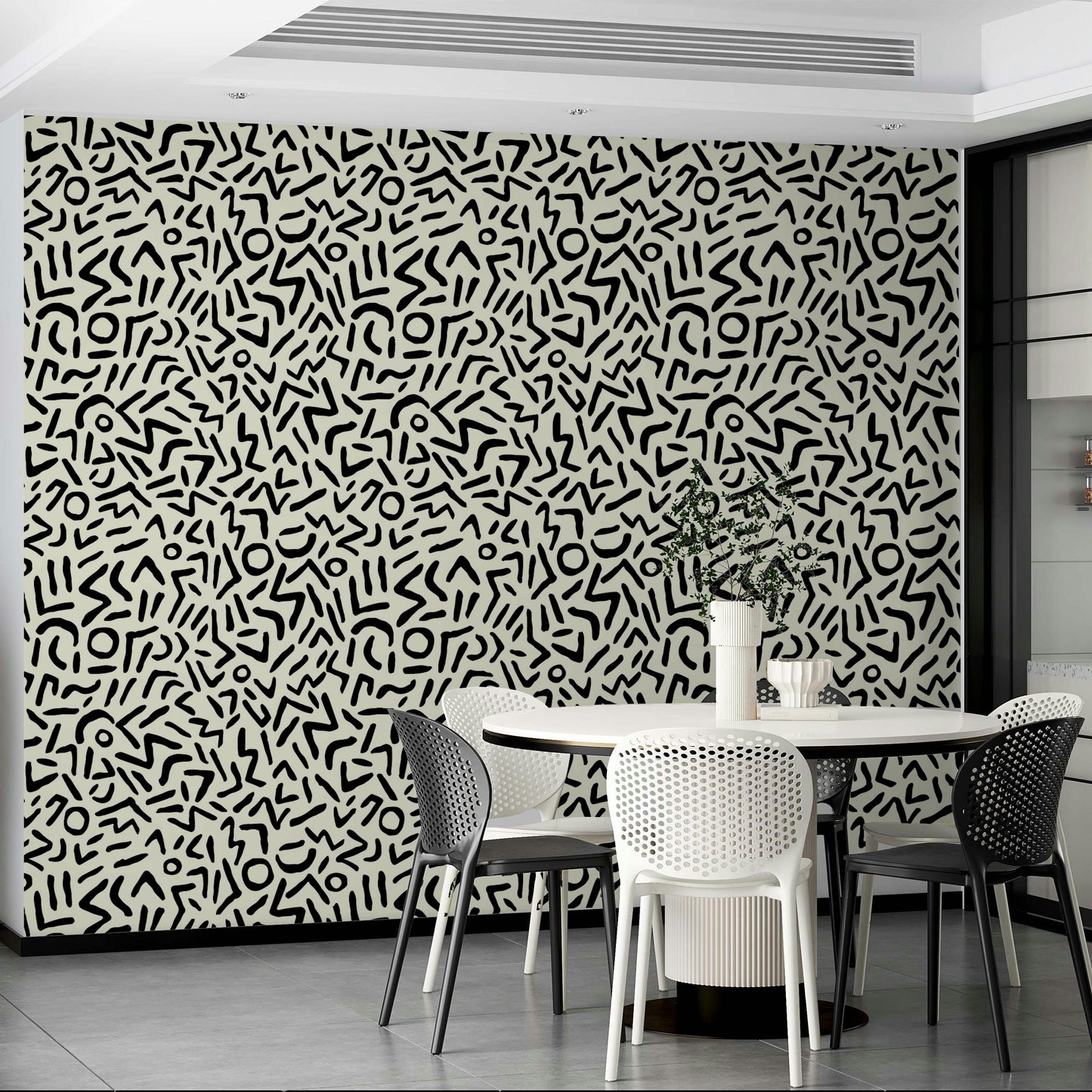 An interior with a fun and artistic accent wall

