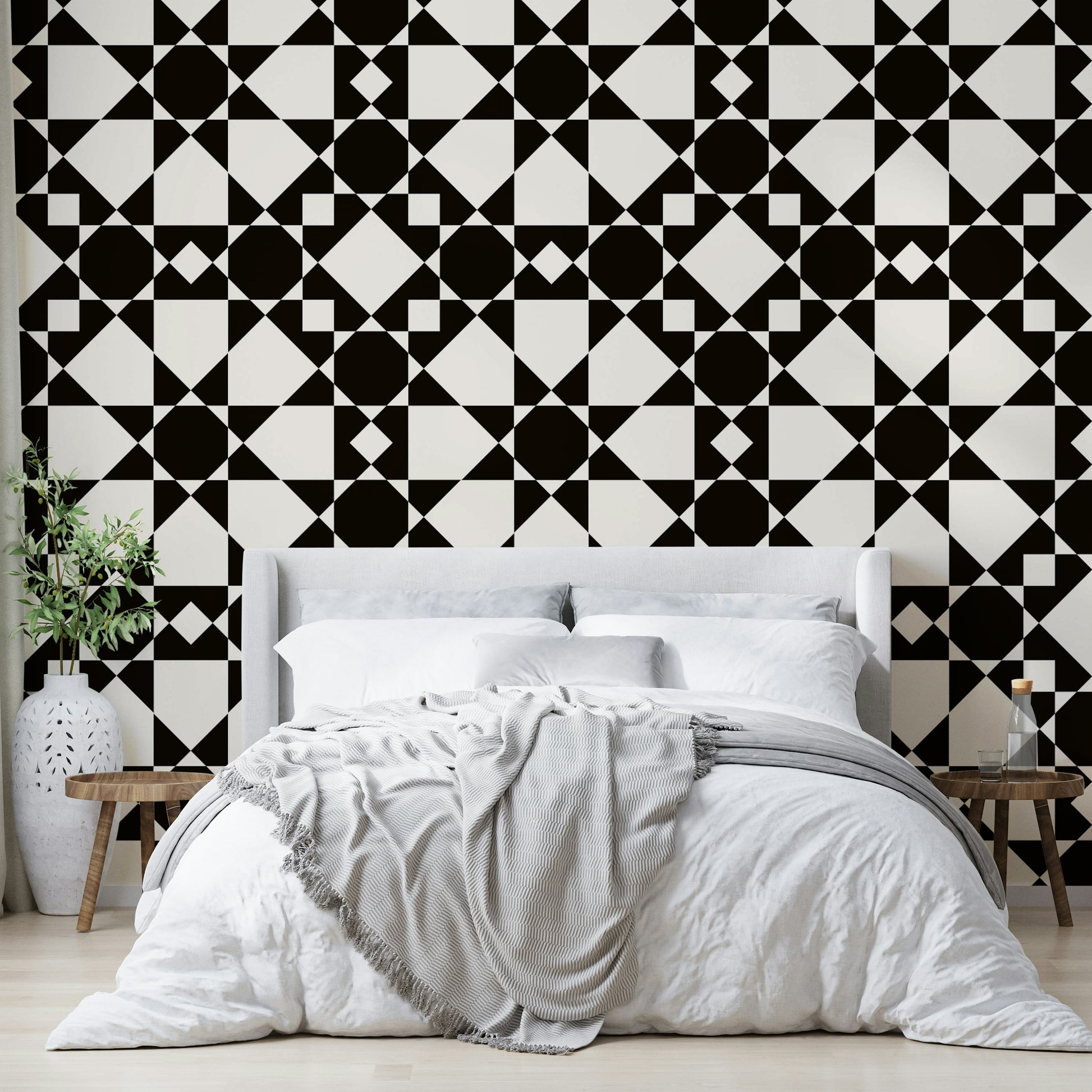 An angled shot of a wall with abstract star wallpaper

