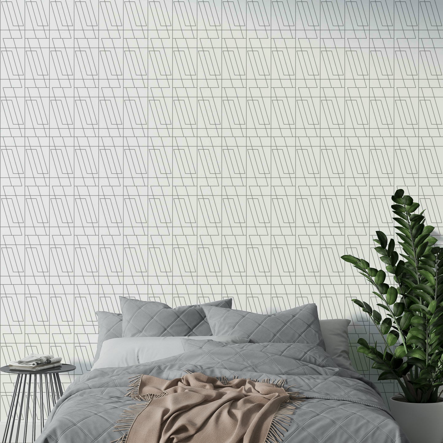 An angled shot of a wall with abstract outline wallpaper

