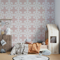 Geometric Flower Cutouts Wallpaper on a living room wall

