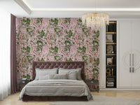 A bedroom decorated with a blossoms mural

