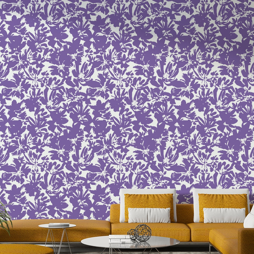 A bedroom decorated with a floral mural

