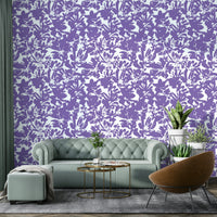 Abstract Painted Purple Flowers Wallpaper on a living room wall

