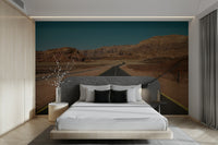 The wallpaper is used as a feature wall in a bedroom.

