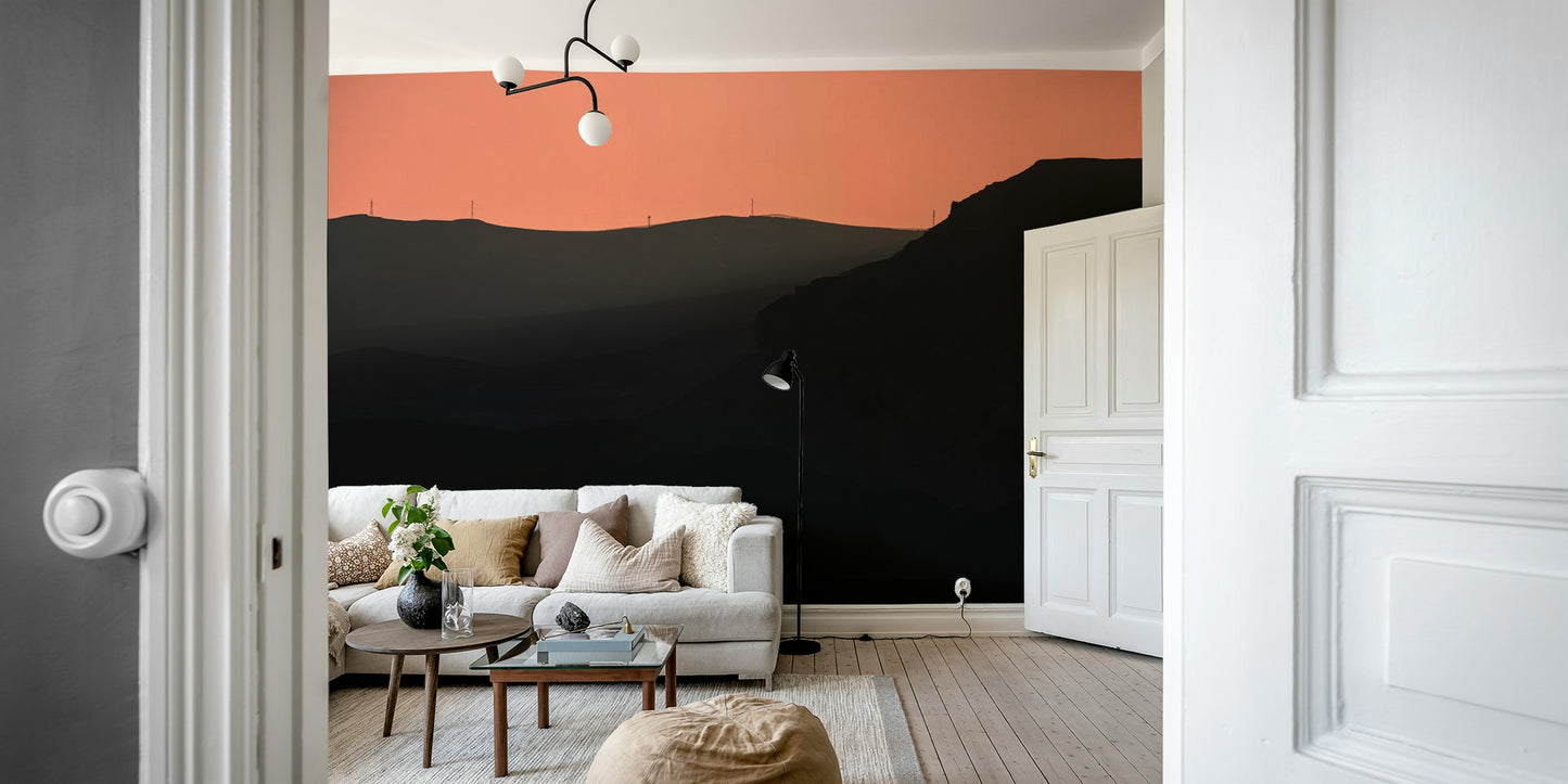 A living room with the mountain landscape wall mural.

