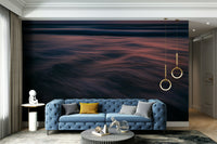 A high-angle view of the wall mural in a large space.

