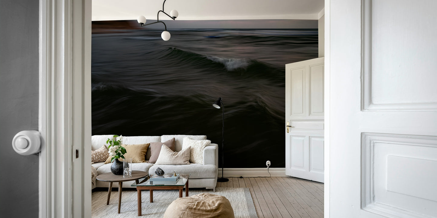 A high-angle view of the wall mural in a large space.

