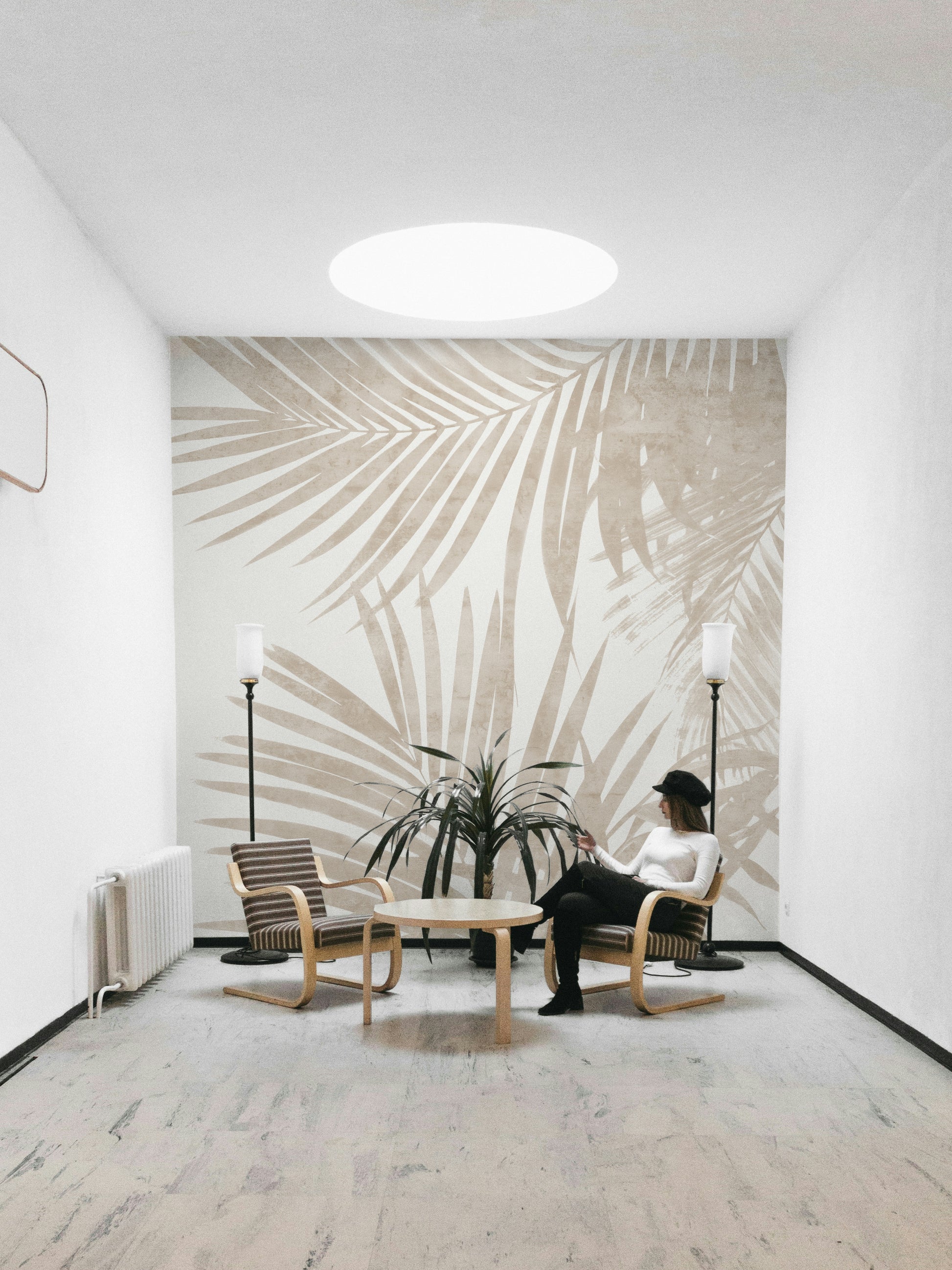 A fashionable botanical mural with a beige tone.