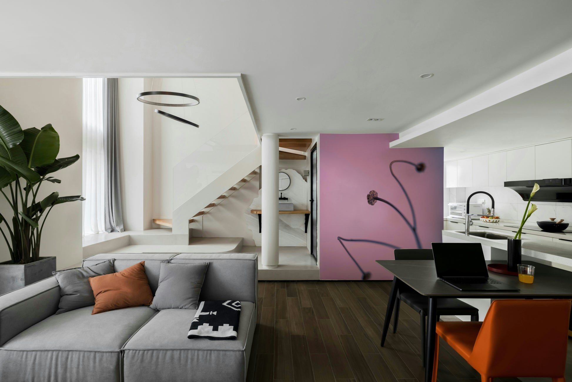 A minimalist home office with the abstract botanical wallpaper.

