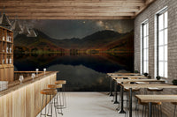 A close-up of the stars and galaxy over the mountains.

