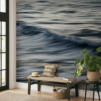 The wallpaper is used to create a feature wall in a dining room.

