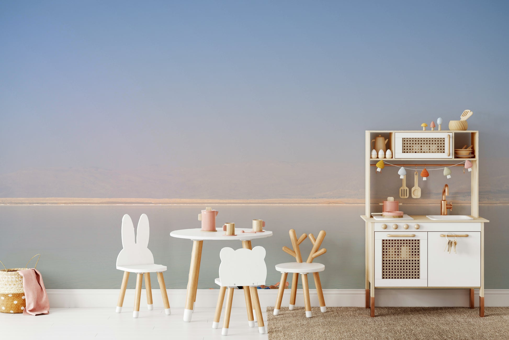 A living room featuring the scenic Dead Sea wall mural.

