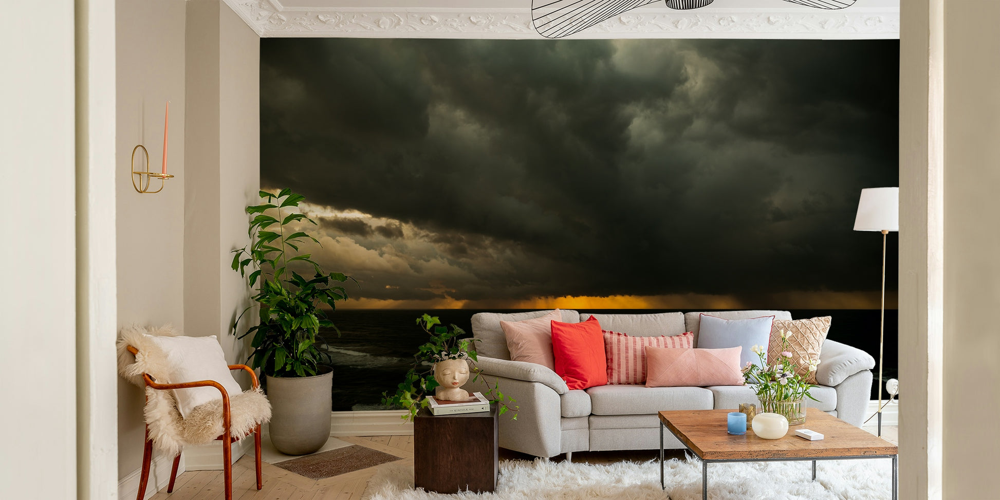 A bedroom with the artistic mural behind the headboard.


