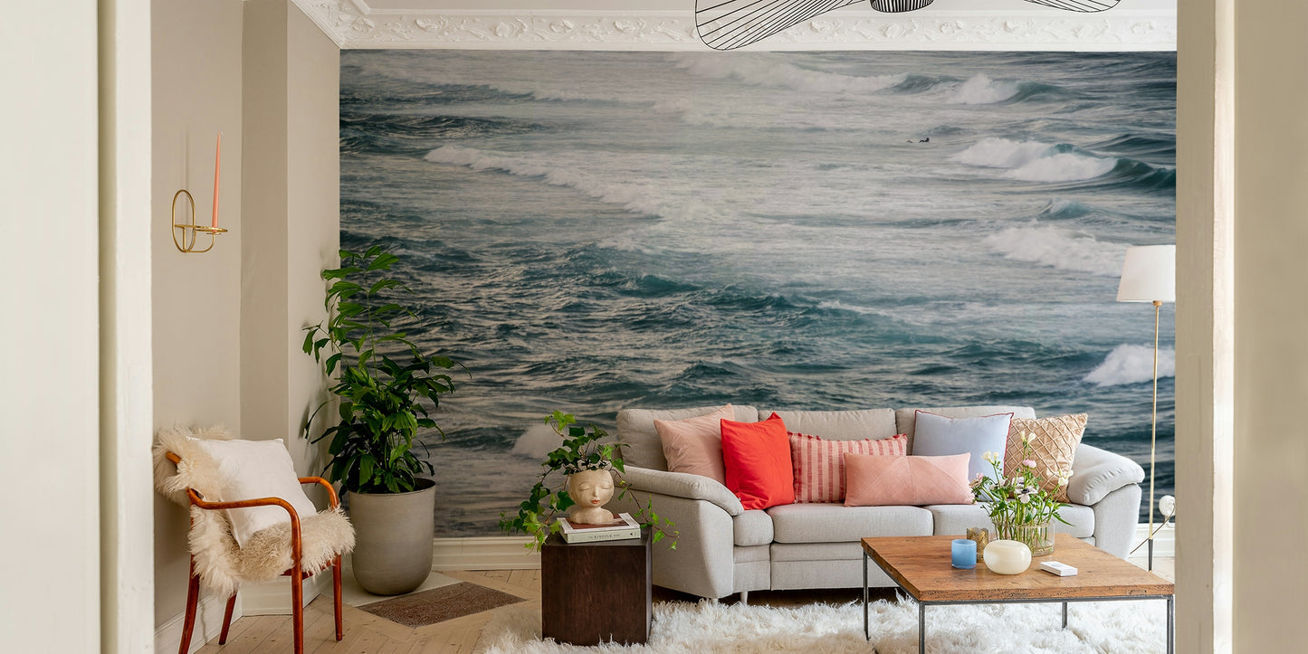 A minimalist interior with the ocean-themed wallpaper.


