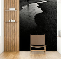 A close-up of the detailed texture in the water and rocks.

