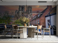 A living room featuring the historic cathedral street mural.
