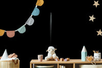 The peel and stick wallpaper on a smooth wall surface.

