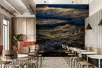 A living room featuring the coastal wall mural.

