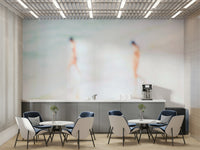 A minimalist interior with the ocean-themed wallpaper.

