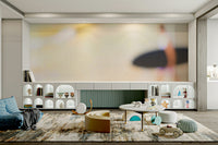 A close-up of the ocean water hitting the rugged rocks.

