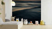 A peaceful open ocean mural on decorative wallpaper.

