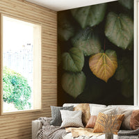 A high-angle view of the wall mural in a large space.

