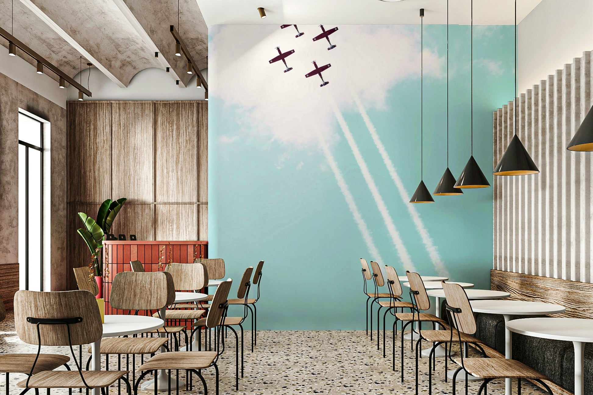 A high-angle view of the wall mural in a large space.