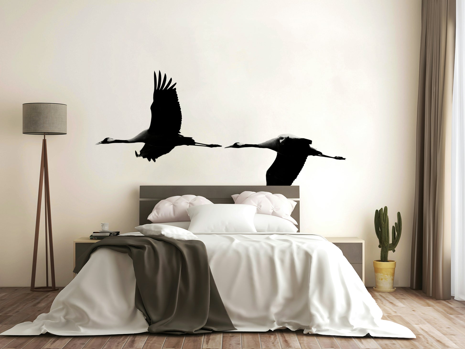 An artistic flying crane mural on minimalist wallpaper.

