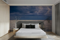 A peaceful seaside view mural on decorative wallpaper.

