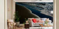 A beautiful coastal rock wallpaper mural with crashing waves.

