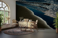 A graceful wave motion wall mural in cool, natural tones.

